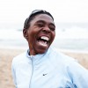 Evelina Tshabalala laughing on beach 2009-005570 copy_2